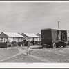 Power unit and laundry shelters at the FSA (Farm Security Administration) migratory farm labor camp mobile unit. Athena, Oregon