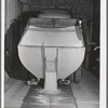 Truckload of bulk wheat being dumped into elevator bin. Eureka, Walla Walla County, Washington