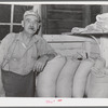He gathers samples of wheat for a central sampling and testing station. Walla Walla County, Washington