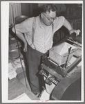 State inspector running dockage test on wheat. Walla Walla County, Washington