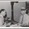 Farmer selling his wheat through the Walla Walla Grain Growers. Walla Walla, Washington