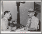 Farmer selling his wheat through the Walla Walla Grain Growers. Walla Walla, Washington