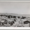 Eureka, Walla Walla, Washington. This was taken from top of elevator. Notice the sack warehouse along right of road