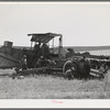 Working on combine. Walla Walla County, Washington
