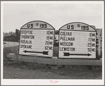 Highway sign at Colfax. Whitman County, Washington