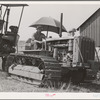 Caterpillar tractor used to draw combine in wheat field. Whitman County, Washington