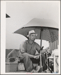 Driver of caterpillar tractor. Wheat field, Whitman County, Washington