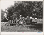 Combine with gasoline drums. Whitman County, Washington