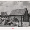Barn and hay wagon in cut-over area. Boundary County, Idaho