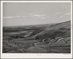 Highway leading down to the gorge at the Columbia River from the bench land. Klickitat County, Washington