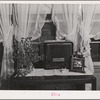 In the living room of farm family, members of Boundary Farms, FSA (Farm Security Administration) project. Boundary County, Idaho