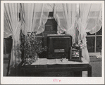 In the living room of farm family, members of Boundary Farms, FSA (Farm Security Administration) project. Boundary County, Idaho