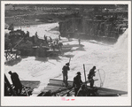 Indians fishing for salmon at Celilo Falls, Oregon. At the present time Indians have by treaty exclusive right for fishing in Columbia River which is adjacent to their reservation. This right is now being contested in lawsuits