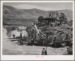 Indians fishing for salmon at Celilo Falls, Oregon