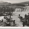 Indians fishing for salmon at Celilo Falls, Oregon