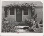 Front door of house for permanent farm workers at the FSA (Farm Security Administration) farm family migratory labor camp. Yakima, Washington
