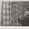 House cleaning, farmhouse. Yakima County, Washington