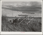 Binder stands outside because of lack of storage space on farm of FSA (Farm Security Administration) rehabilitation borrower who rents from Indian. Yakima County, Washington