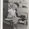 Little girl playing at the nursery school at the FSA (Farm Security Administration) farm family migratory labor camp. Yakima, Washington