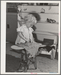 Little girl playing at the nursery school at the FSA (Farm Security Administration) farm family migratory labor camp. Yakima, Washington