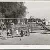 Children playing at the nursery school at the FSA (Farm Security Administration) farm family migratory labor camp. Yakima, Washington