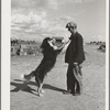 Farmer and his dog. Yakima County, Washington