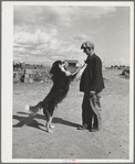 Farmer and his dog. Yakima County, Washington