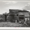 Shed on farm of FSA (Farm Security Administration) rehabilitation borrower who rents from Indian. Yakima County, Washington