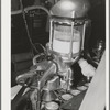 Machine which adds salt to can of salmon. Columbia River Packing Association, Astoria, Oregon