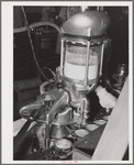 Machine which adds salt to can of salmon. Columbia River Packing Association, Astoria, Oregon