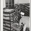 Putting gutted tuna into trays in which it will be steamed. Columbia River Packing Association, Astoria, Oregon