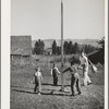 Playtime at the FSA (Farm Security Administration) mobile camp for migratory farm workers. Odell, Oregon