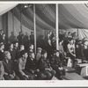 Audience at amateur night at the FSA (Farm Security Administration) mobile camp for migratory farm workers. Odell, Oregon