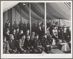 Audience at amateur night at the FSA (Farm Security Administration) mobile camp for migratory farm workers. Odell, Oregon