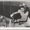 Lunchtime at the nursery school at the FSA (Farm Security Administration) mobile camp for migratory farm workers. Odell, Oregon