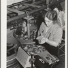 Wrapping and packing pears. Hood River, Oregon