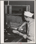 Salmon butcher. Columbia River Packing Association, Astoria, Oregon