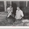 Slicing salmon for canning, Columbia River Packing Association, Astoria, Oregon