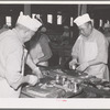 Putting salmon into cans. Columbia River Packing Association, Astoria, Oregon