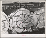Closing ovens in which canned salmon is cooked. Columbia River Packing Association, Astoria, Oregon