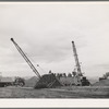 One of the igloos at the Umatilla ordnance depot under construction. Hermiston, Oregon