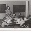 School in basement of church. Hermiston, Oregon. The school board didn't have adequate buses for transportation of all the children of workmen at Umatilla ordnance depot and consequently many did not attend school