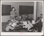 School in basement of church. Hermiston, Oregon. The school board didn't have adequate buses for transportation of all the children of workmen at Umatilla ordnance depot and consequently many did not attend school