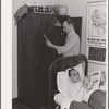 Workmen at the Navy shipyards in their room at the FSA (Farm Security Administration) dormitories. Bremerton, Washington
