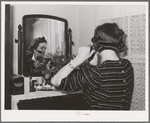 Room in FSA (Farm Security Administration) dormitories occupied by women who work at the Navy shipyards. Bremerton, Washington