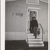 Workman at the Navy shipywards arrives at the FSA (Farm Security Administration) duration dormitory looking for a room. Bremerton, Washington