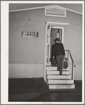 Workman at the Navy shipywards arrives at the FSA (Farm Security Administration) duration dormitory looking for a room. Bremerton, Washington