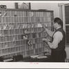 Mail racks for occupants of the FSA (Farm Security Administration) duration dormitories for workers at the Navy shipyards. Bremerton, Washington