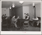 Men who work at the Navy shipyards in the community room at the FSA (Farm Security Administration) dormitories. Bremerton, Washington