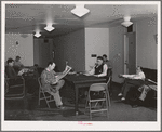 Men who work at the Navy shipyards in the community room at the FSA (Farm Security Administration) dormitories. Bremerton, Washington